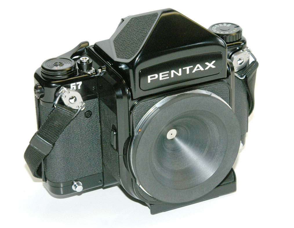 A custom pinhole bodycap for a Pentax 67.